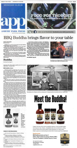 Newspaper page featuring Ray Sheehan of BBQ Buddha, competition barbecue sauces and rubs, and Chef Rays LLC product display.