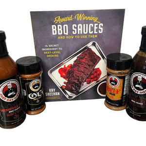 Chef Ray Sheehan BBQ sauces and rubs with award-winning BBQ sauces cookbook on display