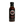 A bottle of Chef Ray Sheehan's Kansas City BBQ Sauce on a transparent background. The bottle is made of dark glass showing the dark brown sauce inside, with a black cap and a black label featuring the brand logo and product name in red and white text.